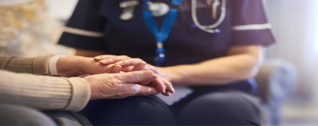 _117384158_gettyimages-1129903329carevisitholdinghand sized